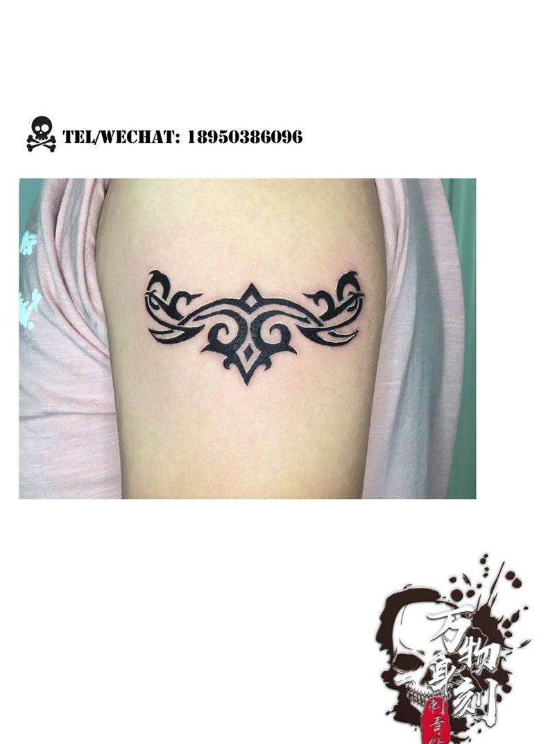 大臂图腾纹身图片