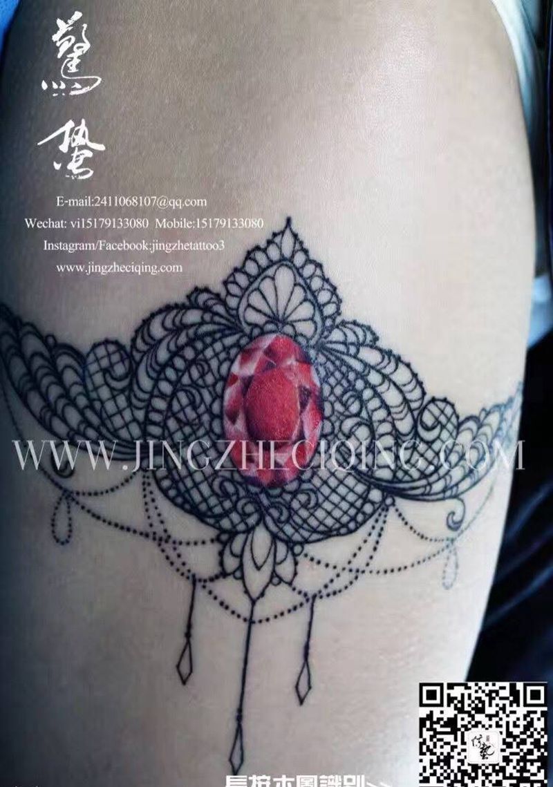 大腿宝石纹身图片