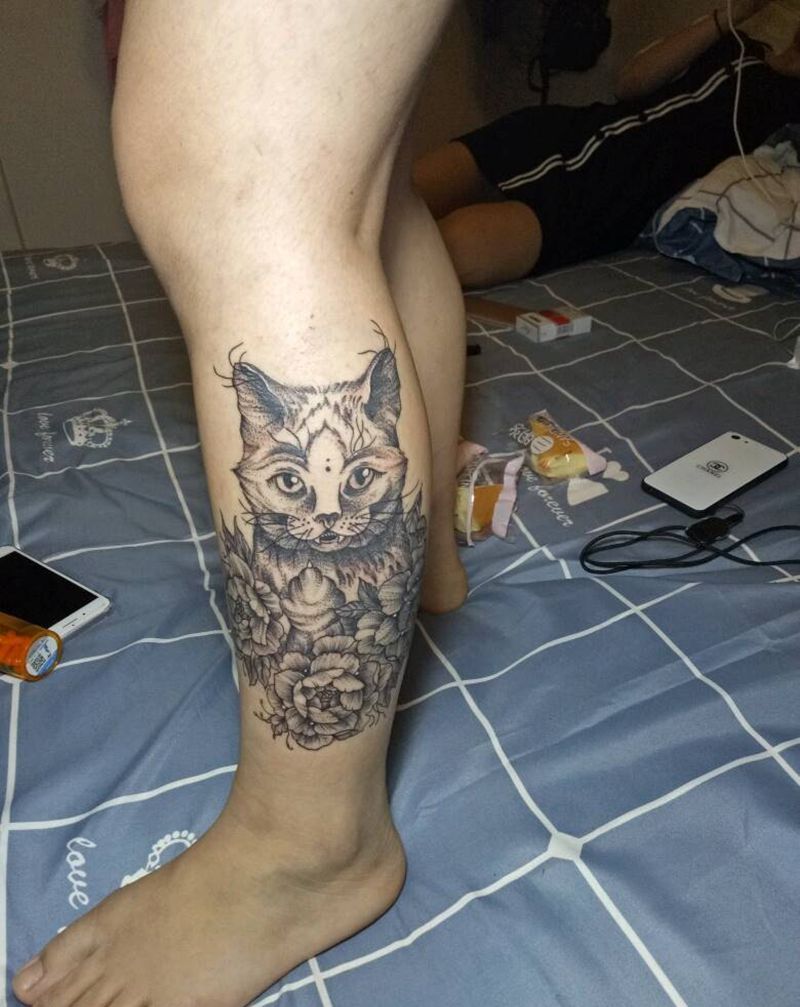 点刺猫纹身图片