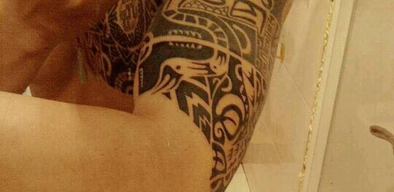 图腾衔接纹身图片