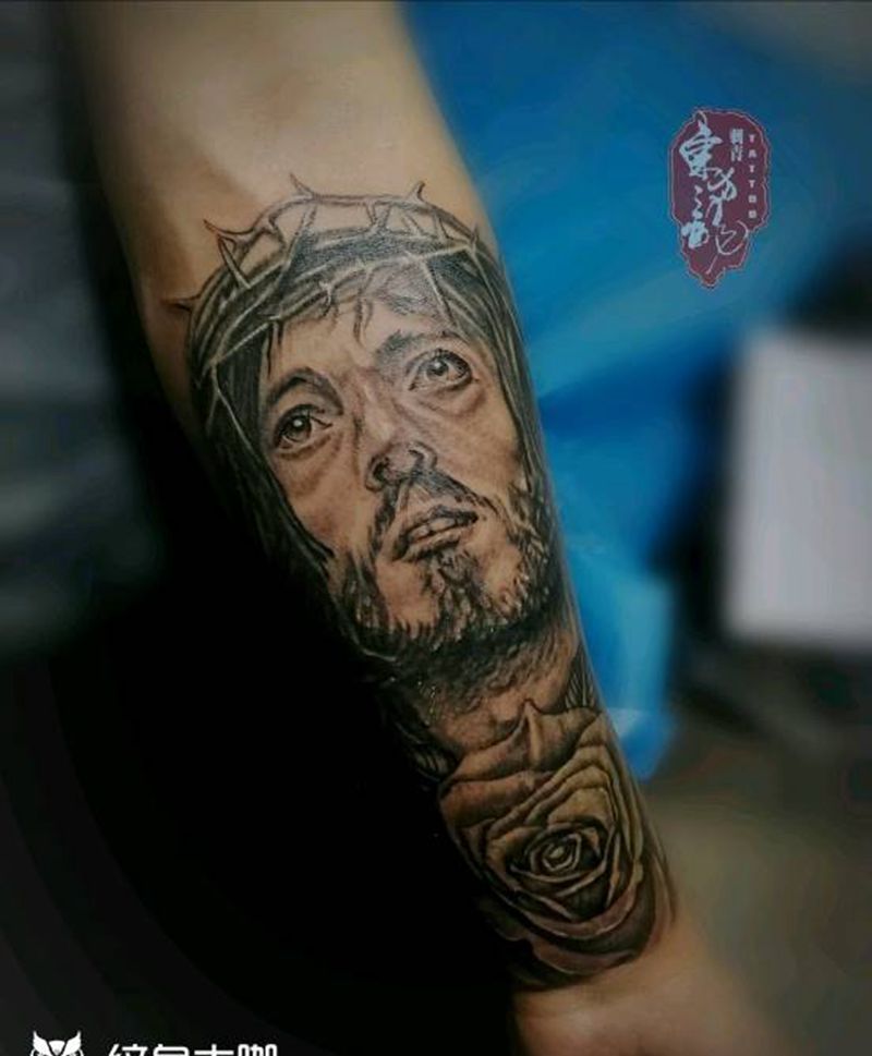 耶稣纹身图片_手臂纹身图案