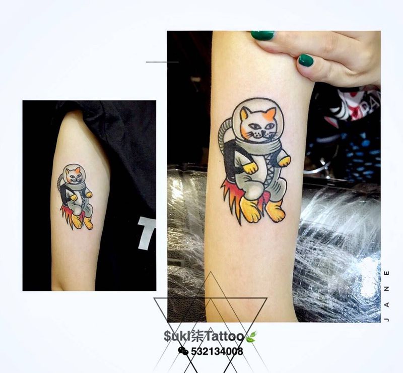 小猫宇航员纹身图片
