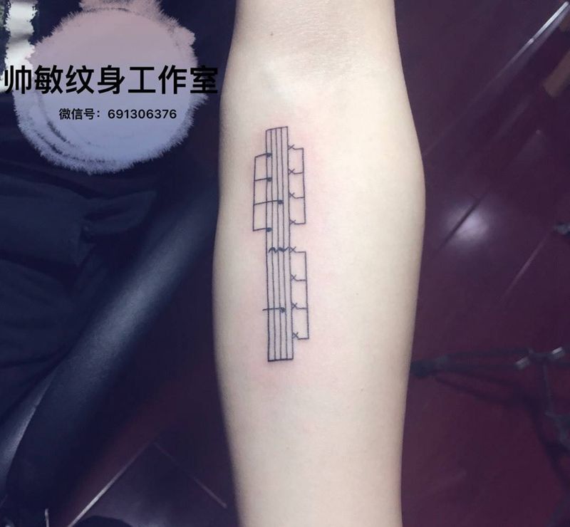 五线谱卍纹身图片_手稿手部写实静物原创帅敏TATO纹身图案
