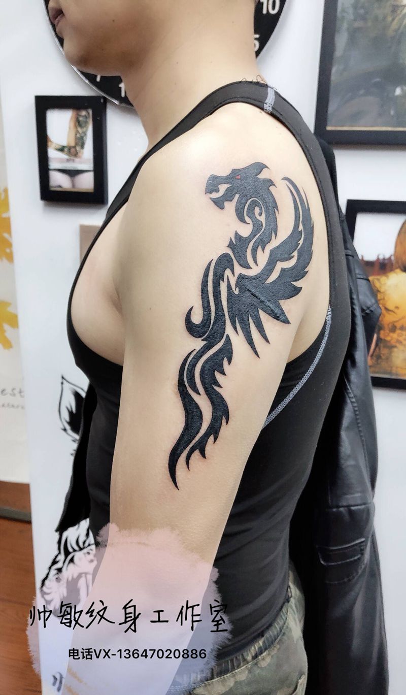 图腾龙纹身图片_手臂纹身图案