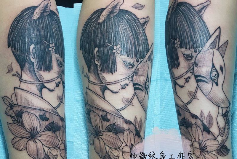 卍纹身图片_腿部纹身图案