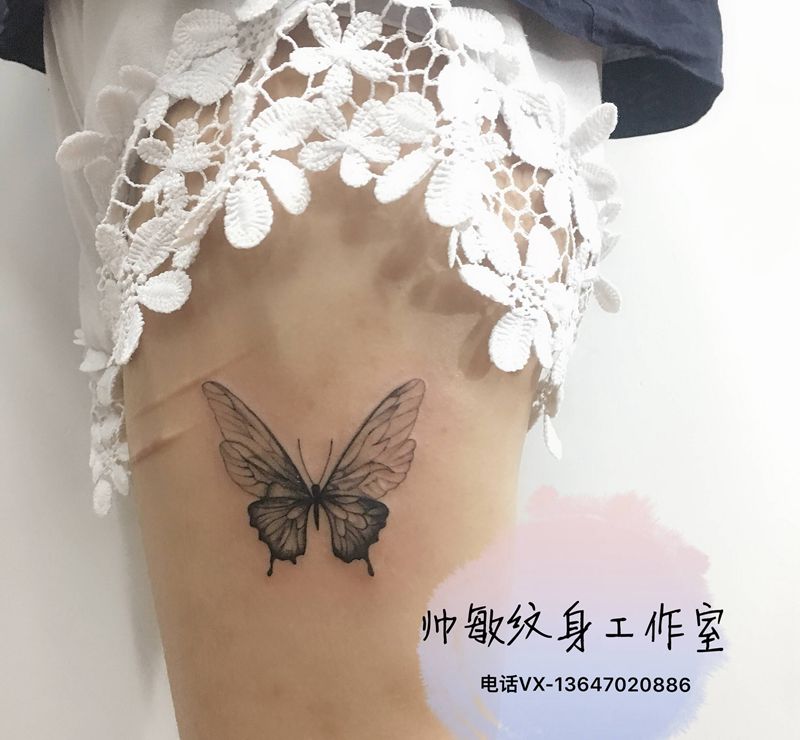 蝴蝶纹身图片_腿部纹身图案