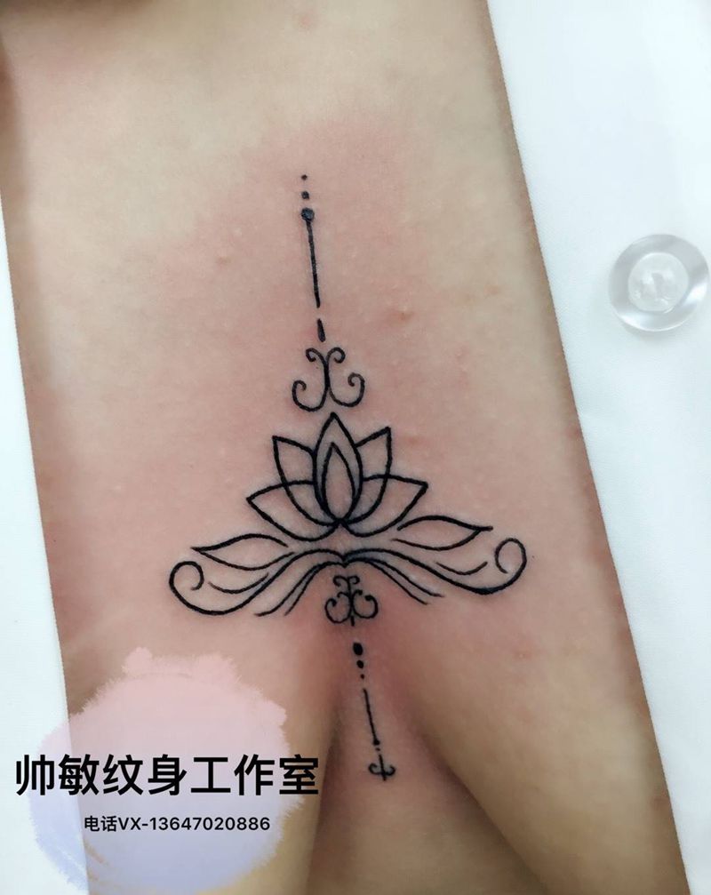 胸花纹身图片_帅敏TATTOO纹身图案