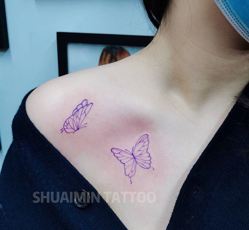 蝴蝶纹身图片_肩部手臂水彩欧美写实纹身图案