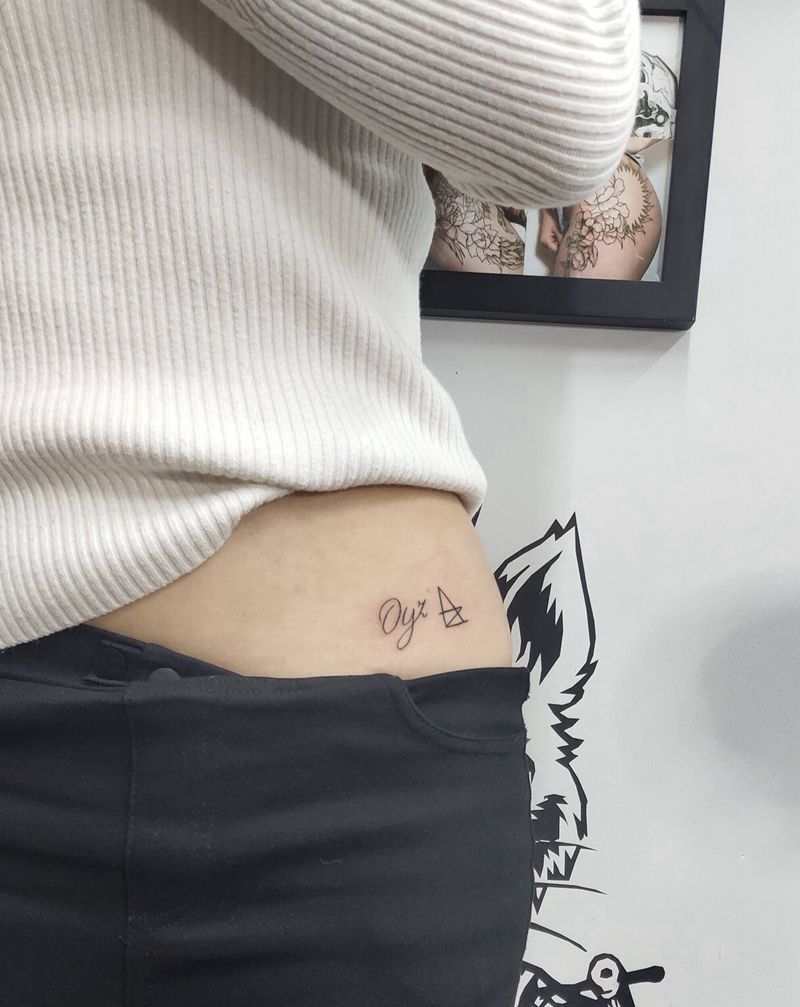 字纹身图片_腰部纹身图案