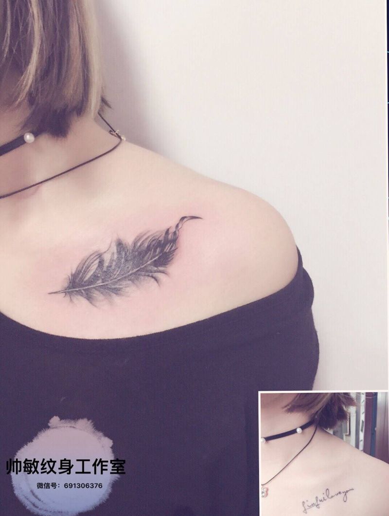 遮盖卍羽毛纹身图片_手稿肩部清新静物帅敏TATO纹身图案