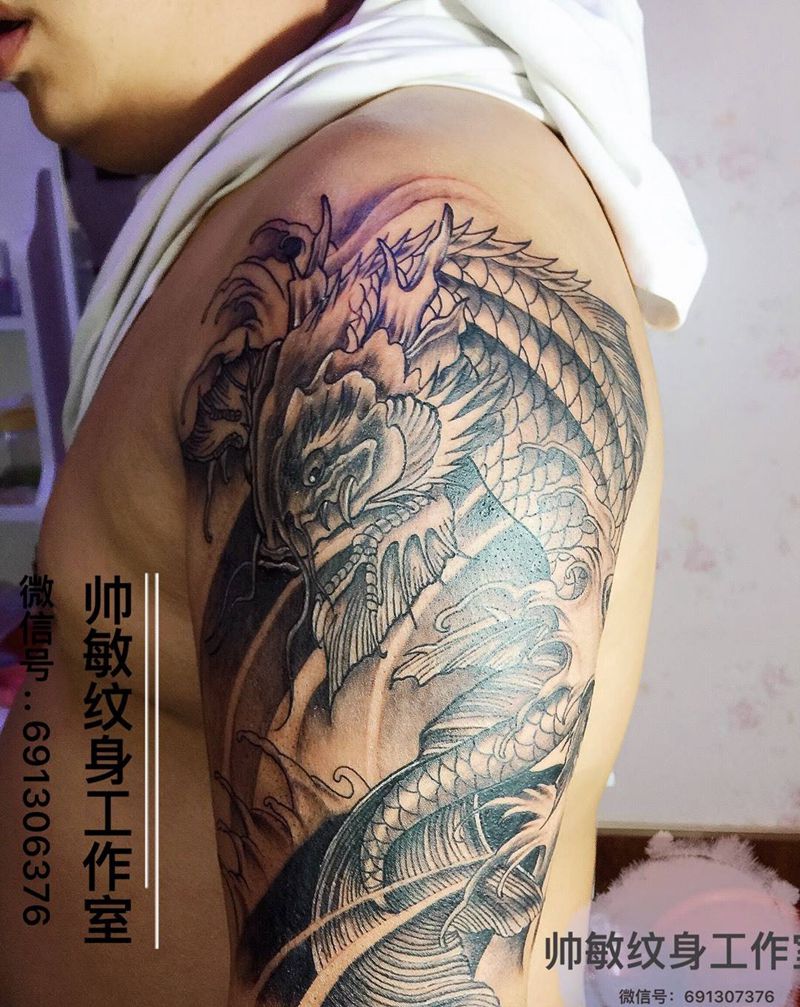 鱼化龙纹身图片_成品手臂传统动物静物纹身图案