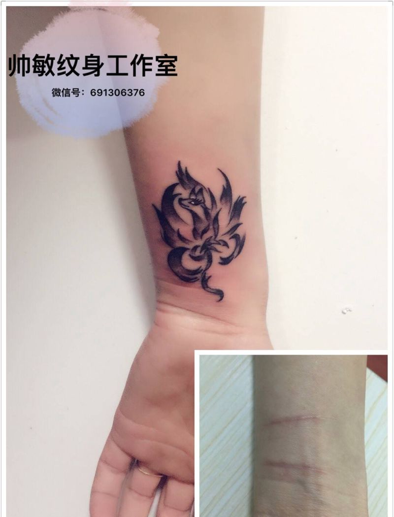九尾狐纹身图片_手臂清新动物帅敏TATO纹身图案