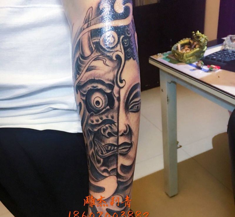 一念之间包小臂纹身图片_成品手臂手部传统肖像人物鬼神宗教纹身图案