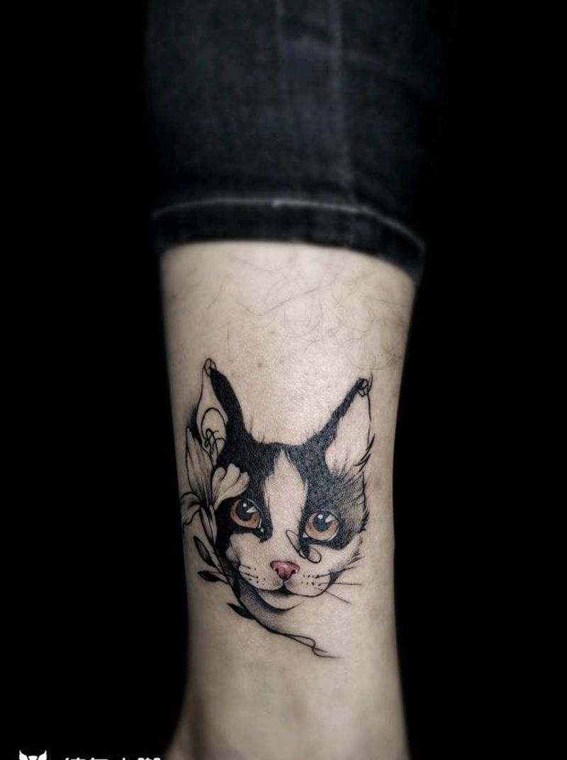 猫咪一枚纹身图片_腿部纹身图案