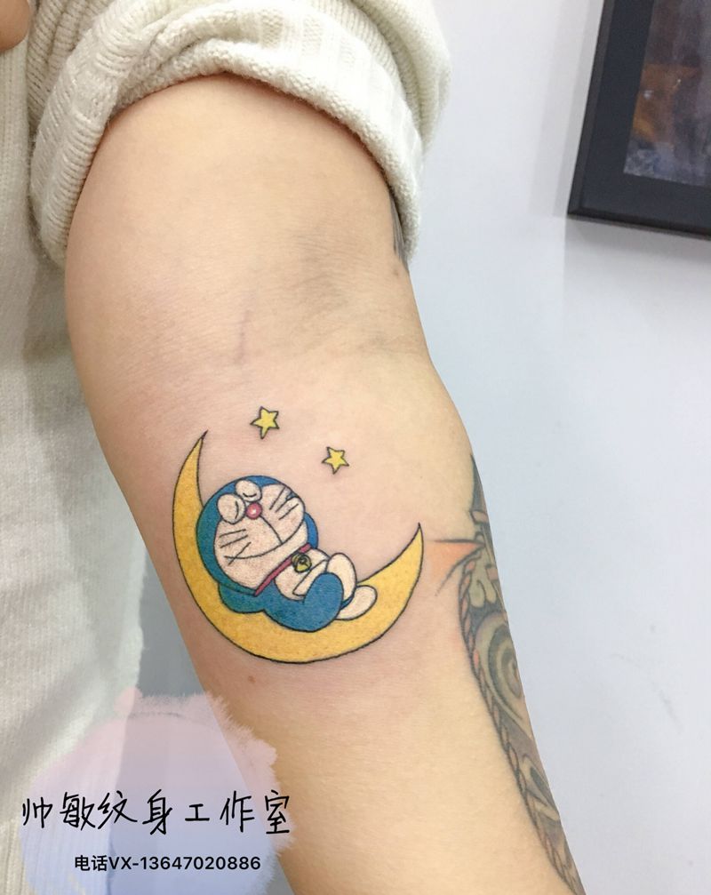 叮当猫纹身图片_手臂纹身图案