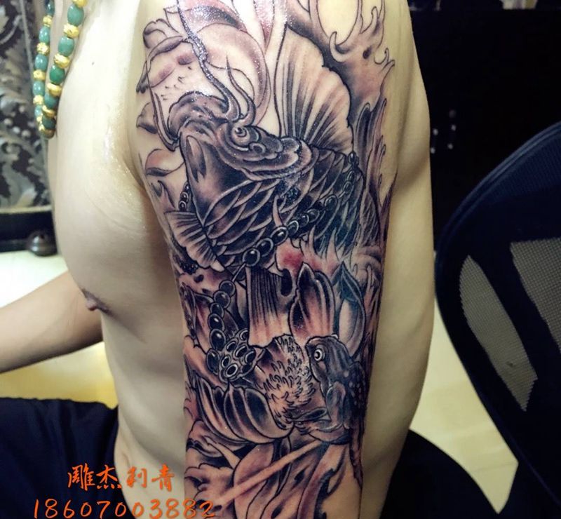 鱼纹身图片_成品手臂传统动物宗教纹身图案