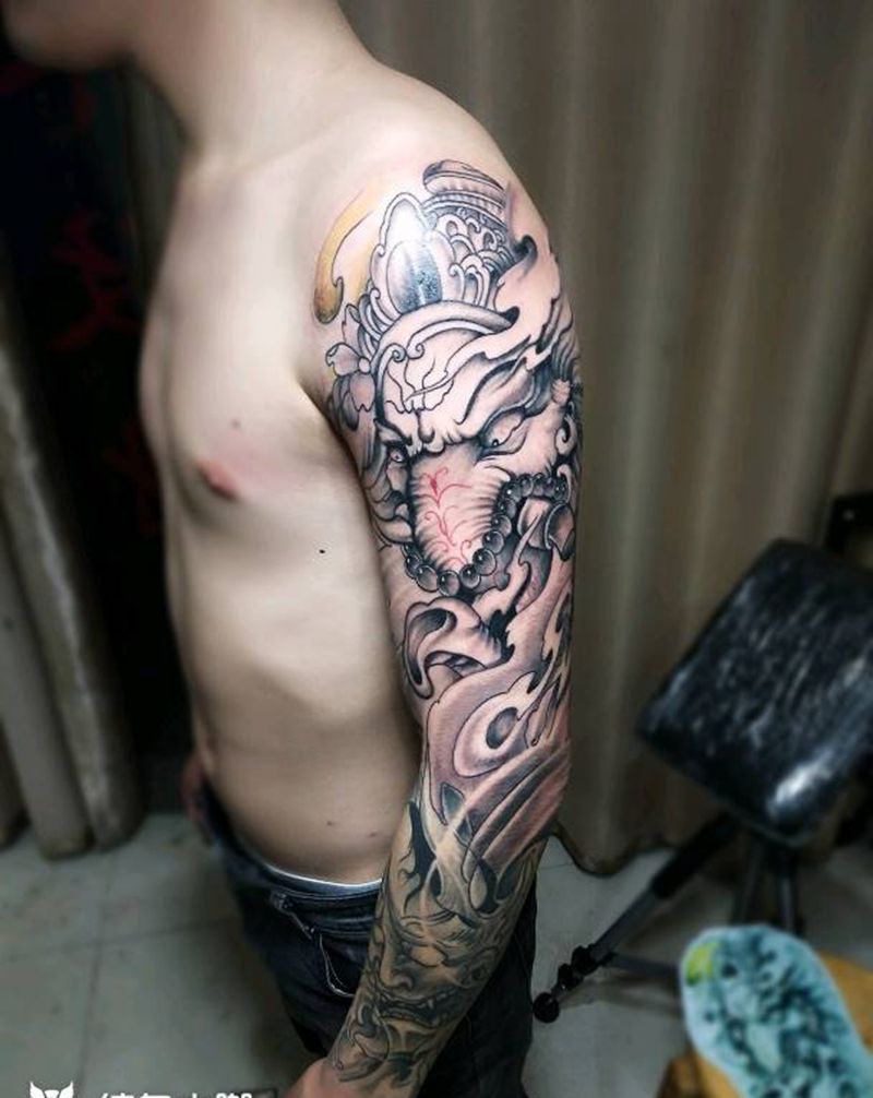 象神花臂小臂是去年做的纹身图片