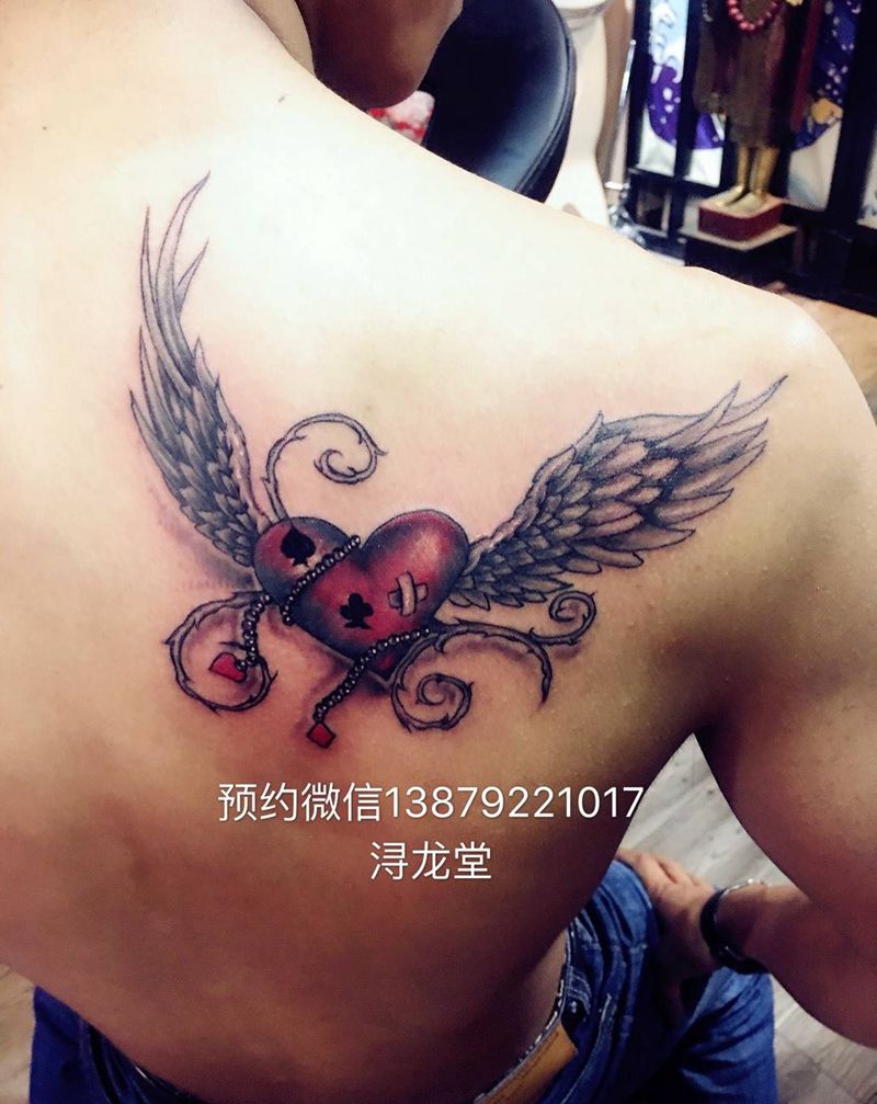 翅膀纹身图片_背部清新彩色情侣原创纹身图案