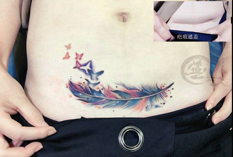 羽毛纹身图片_腹部水彩纹身图案