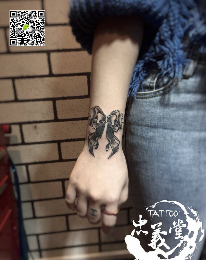 蝴蝶结纹身图片_腿部新传统纹身图案
