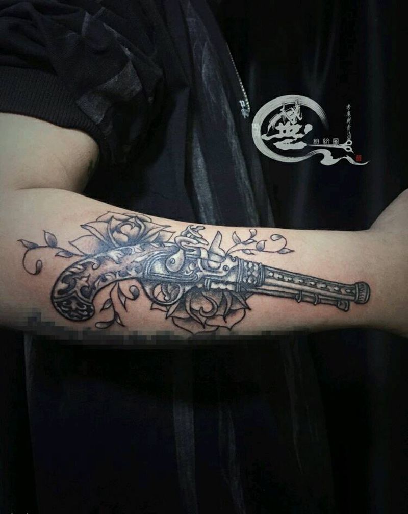 火枪纹身图片_手臂欧美纹身图案