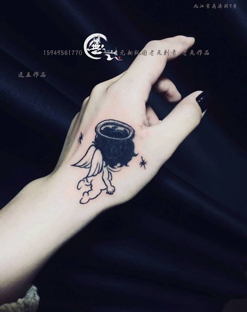 遮盖纹身图片_手部遮盖纹身图案