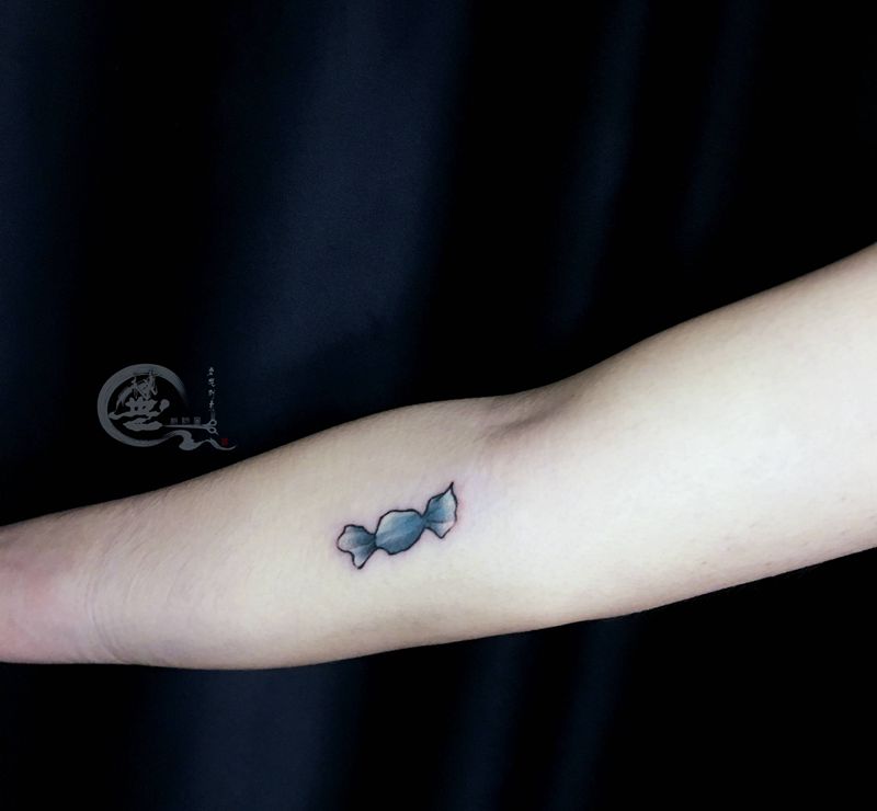 糖果纹身图片_手臂纹身图案