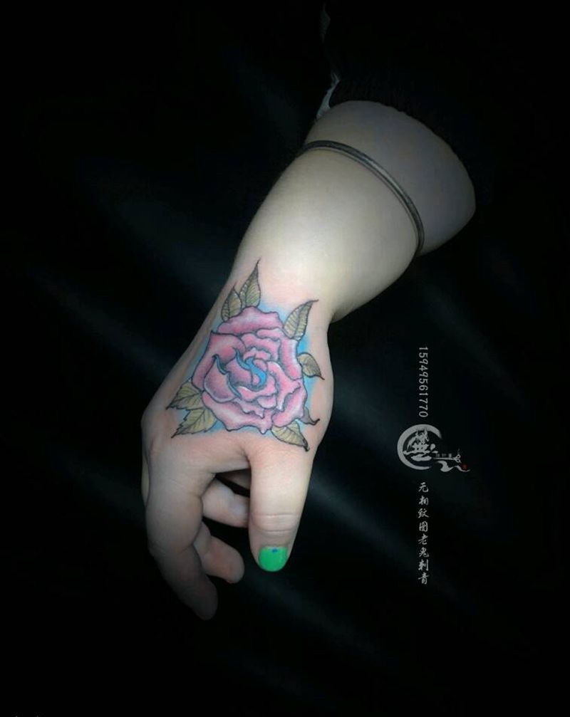 遮盖（花）纹身图片_手部纹身图案