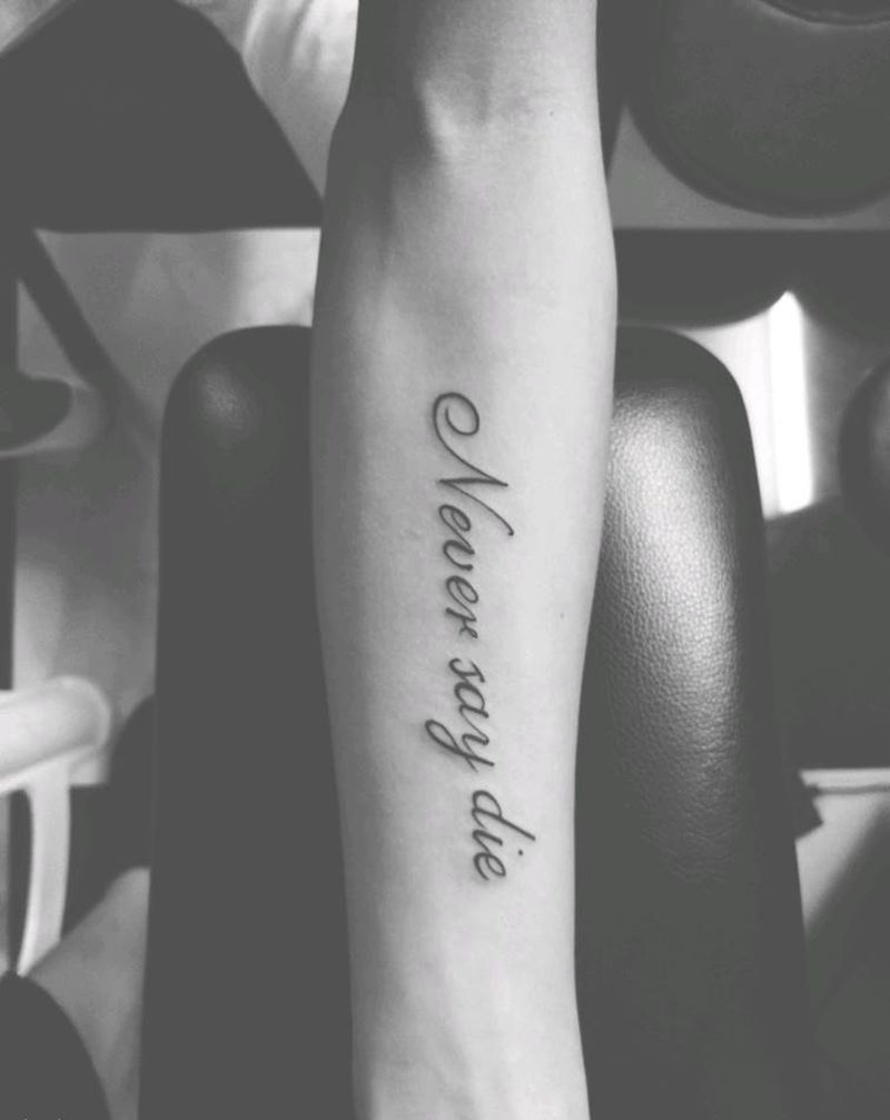 永不气馁纹身图片