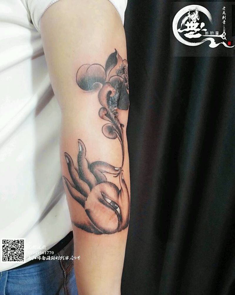 疤痕遮盖纹身图片_手臂传统宗教成品纹身图案