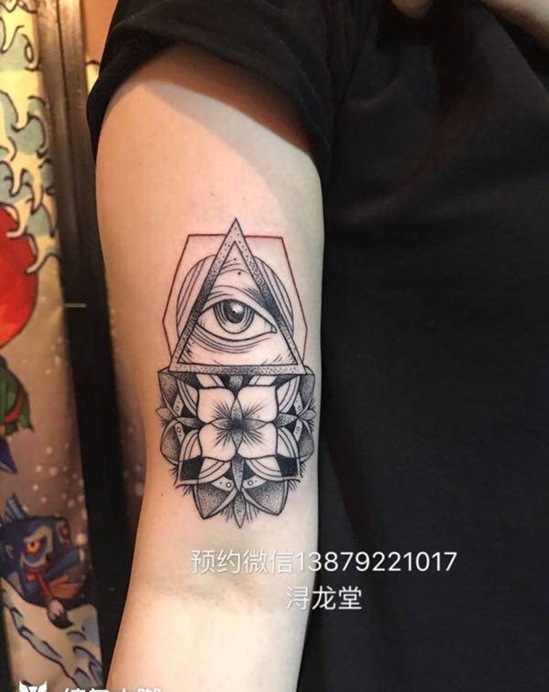 眼睛与曼陀罗花纹身图片_手臂腿部背部纹身图案