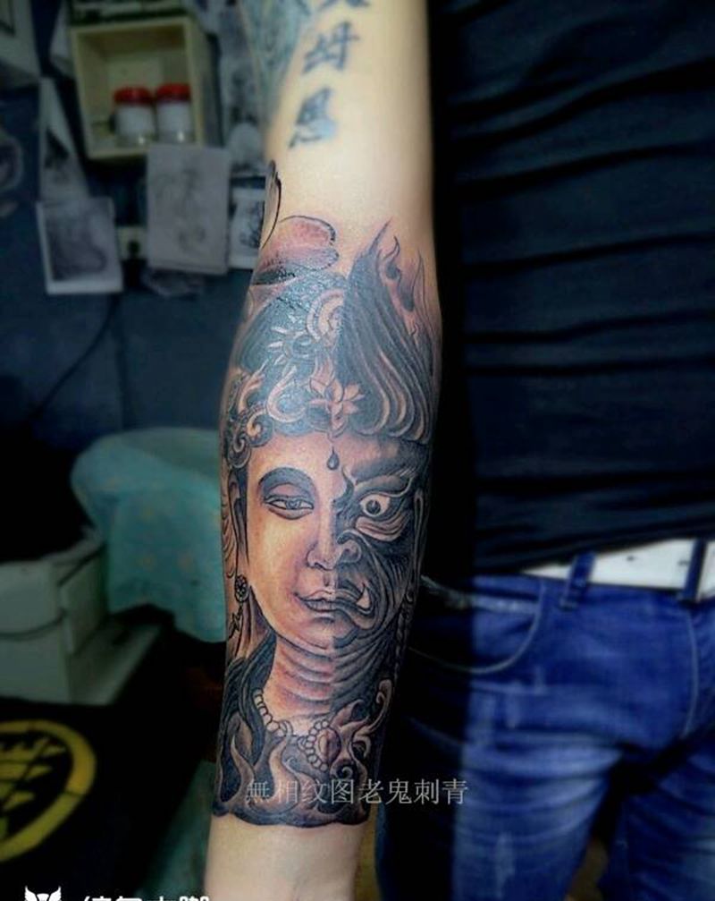 一念佛魔纹身图片_手臂传统成品纹身图案
