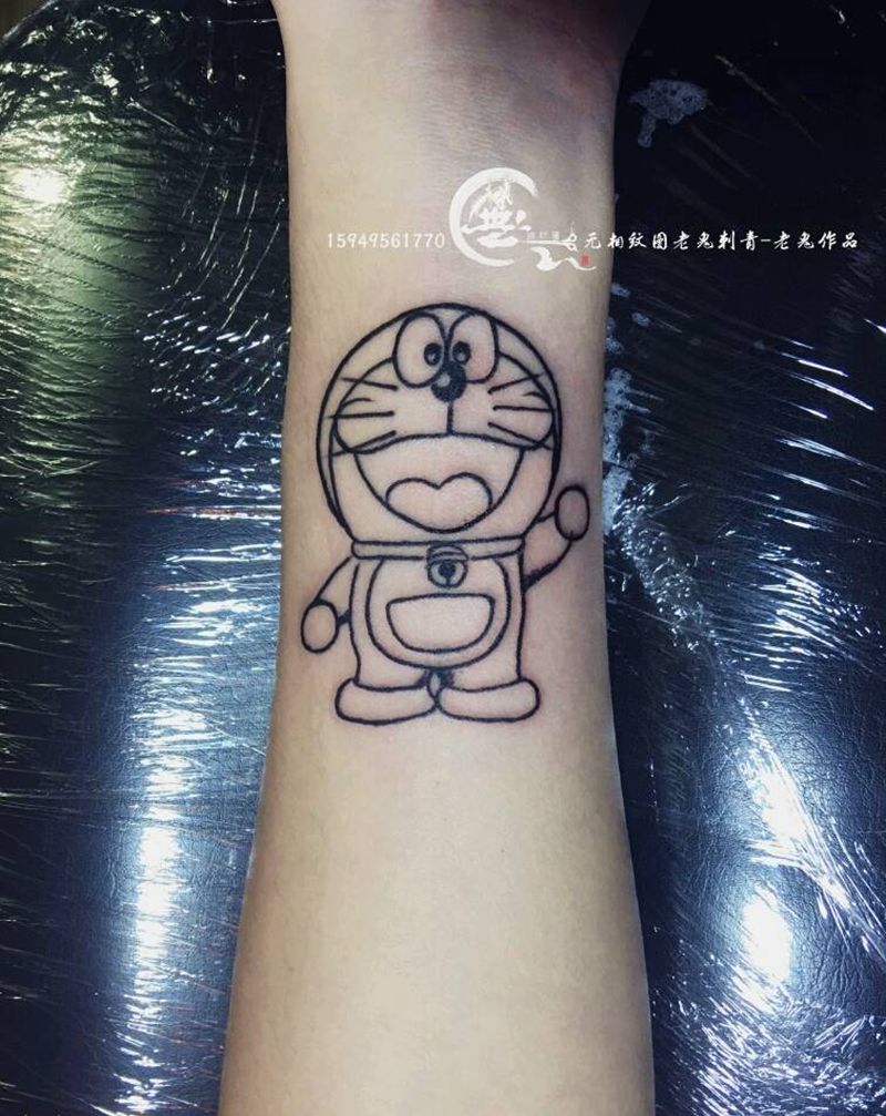 情怀纹身图片_手臂动漫纹身图案