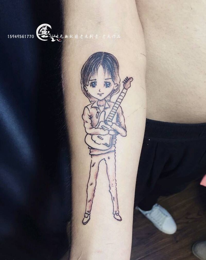 卡通画黄家驹纹身图片_手部卡通纹身图案