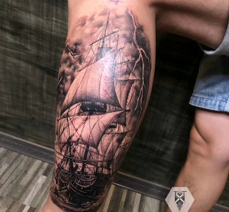 披荆斩棘纹身图片_腿部欧美写实纹身图案