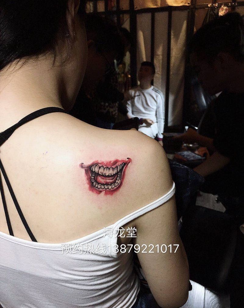 小嘴嘟嘟纹身图片