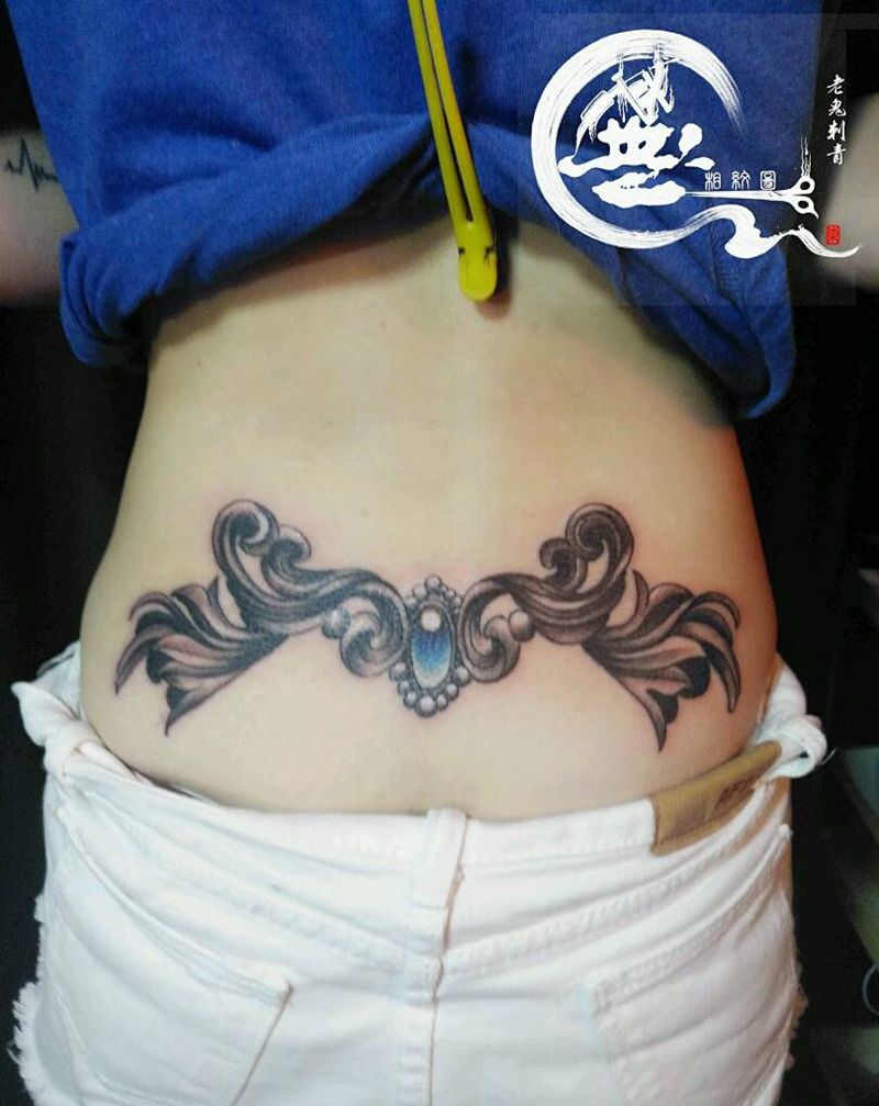 花腰纹身图片_腰部欧美成品纹身图案