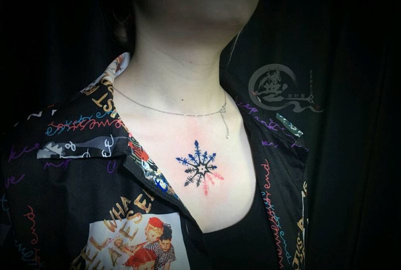 雪花纹身图片_胸部图腾纹身图案