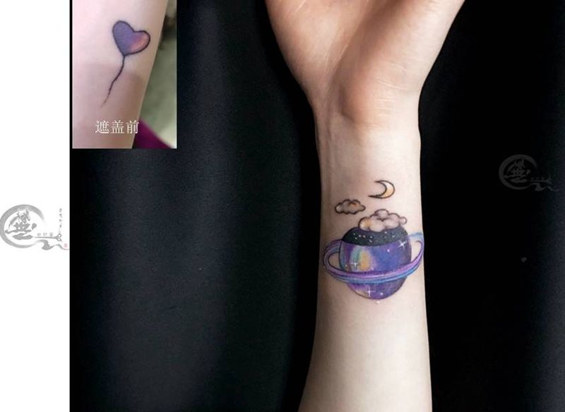 星球遮盖纹身图片_手臂纹身图案