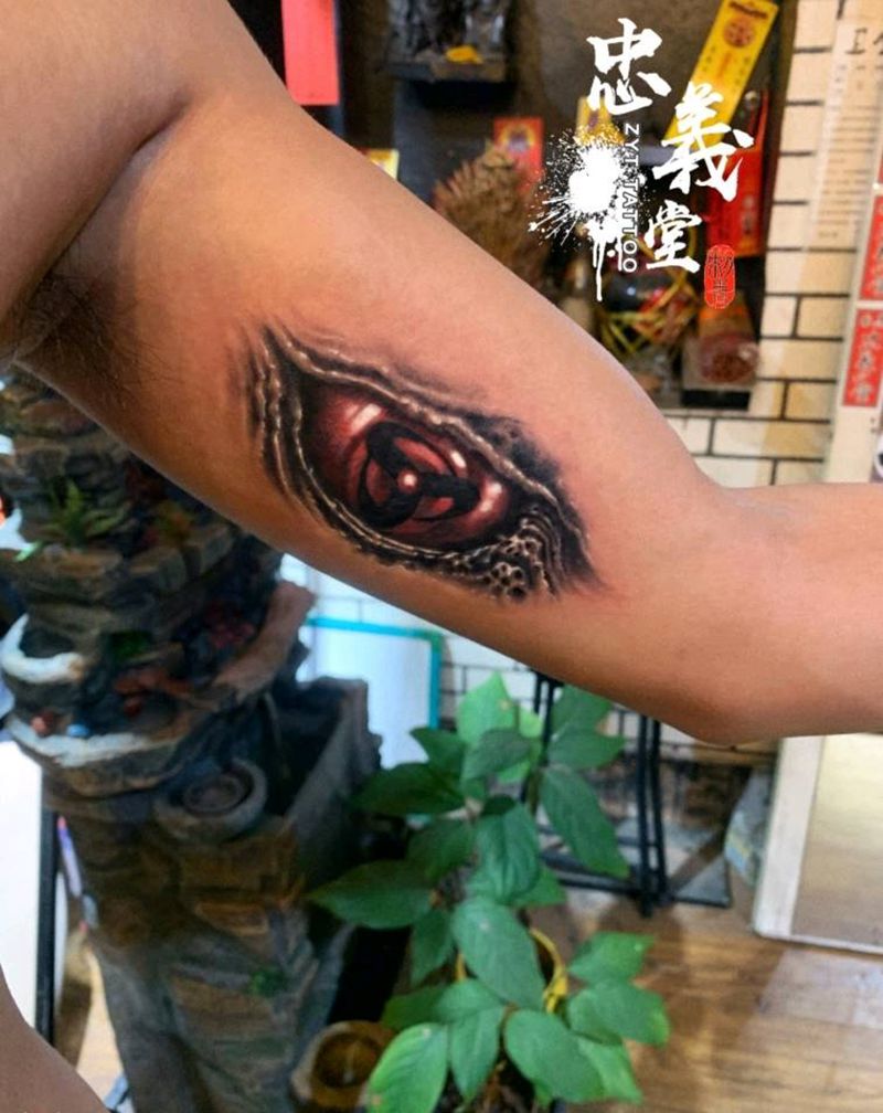 写轮眼纹身图片_欧美写实纹身图案