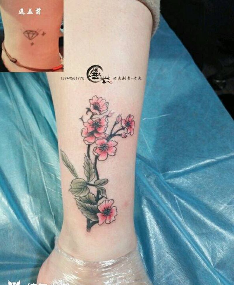 遮盖作品纹身图片_腿部花卉遮盖成品纹身图案