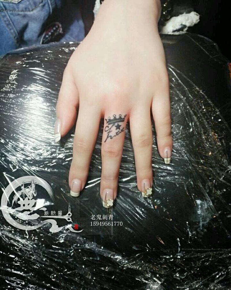 手指纹身纹身图片_手部字符成品纹身图案