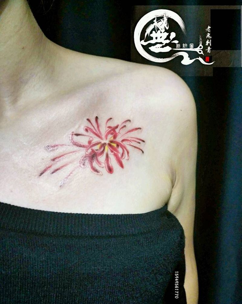 彼岸花纹身图片_胸部花卉成品纹身图案