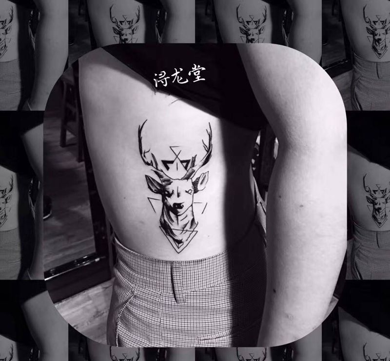 鹿纹身图片_腰部纹身图案