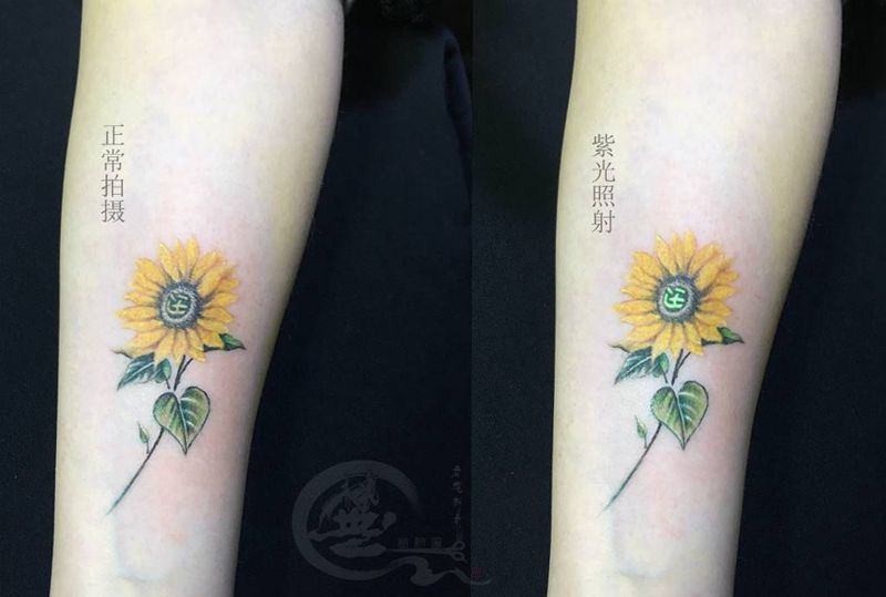 太阳花纹身图片_手臂纹身图案