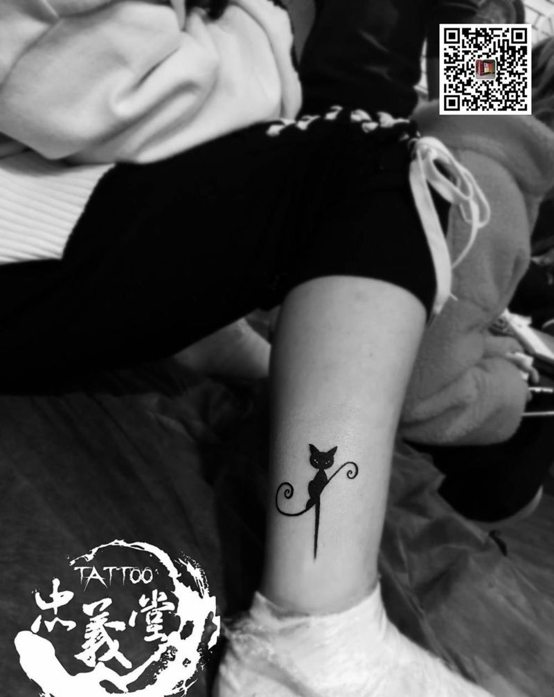 狸猫纹身图片_脚部腿部图腾纹身图案