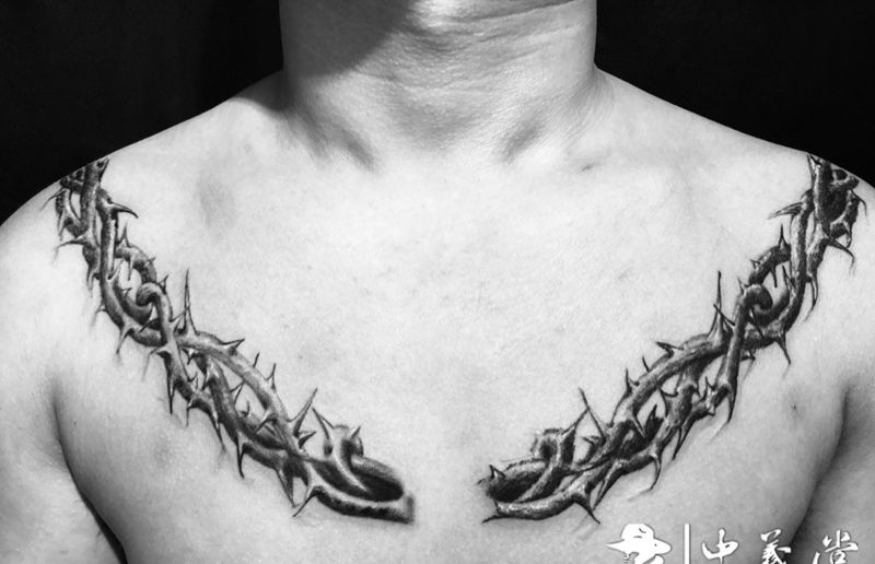 荆棘纹身图片_胸部点刺图腾纹身图案