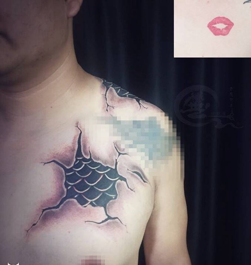 麒麟困兽纹身图片_肩部胸部纹身图案