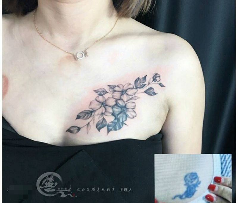 遮盖纹身图片_胸部素花纹身图案