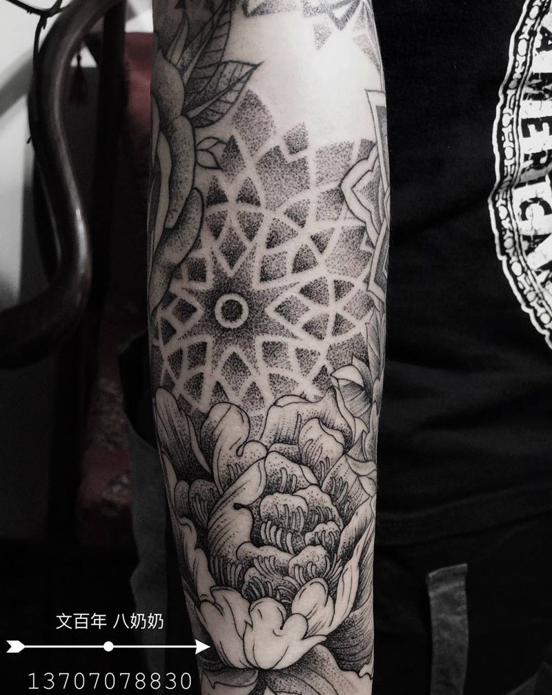 点刺包臂纹身图片